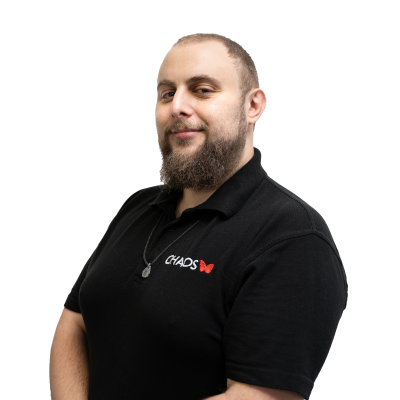 CHAOS Radio Presenter - Adam 'Pudge' Trudgeon wears a black tshirt with the embroidered CHAOS logo with red butterfly on the left chest